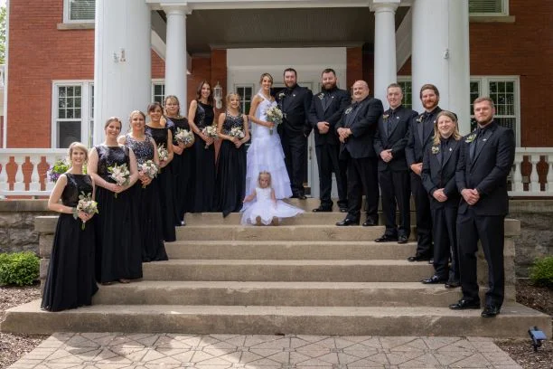 bridal party on front stairs