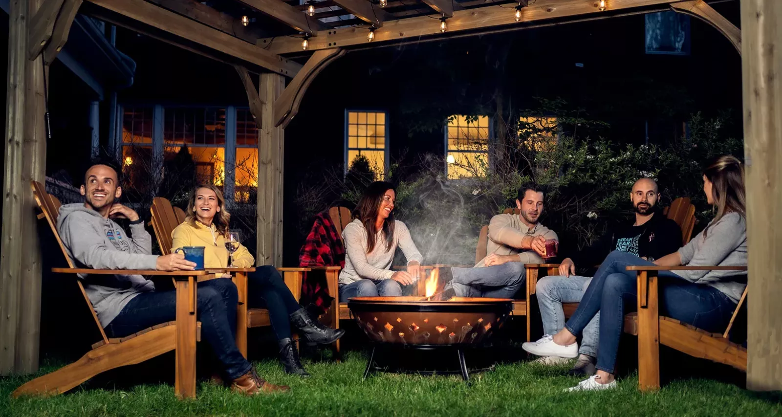 Group Sitting Around Fire Pit